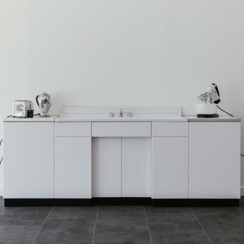 Mel Chin, Ill Posed Inverse Problemware & Pre-Flow Hydro Dynamic Relation Sink, 2012 Installation; sink and modified domestic appliances/ components. 34 x 96 x 24 in / 86.36 x 243.84 x 60.96 cm