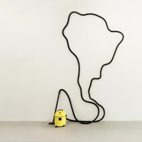 alberto-borea Latinamerica – Vacuum Cleaner, 2017 Vacuum cleaner and extension hose mounted on the wall. 224.4 × 102.4 × 21.7 in (570 × 260 × 55 cm)