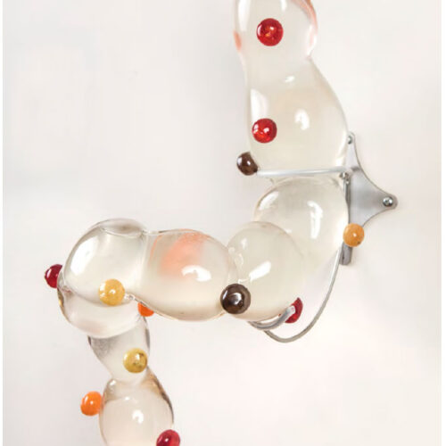 Bio-Reset, 2023 Blown Glass, Encapsulated Primordial Soup, Steel arm 13 x 5.1 x 6.7 in (33 x 13 x 17 cm)